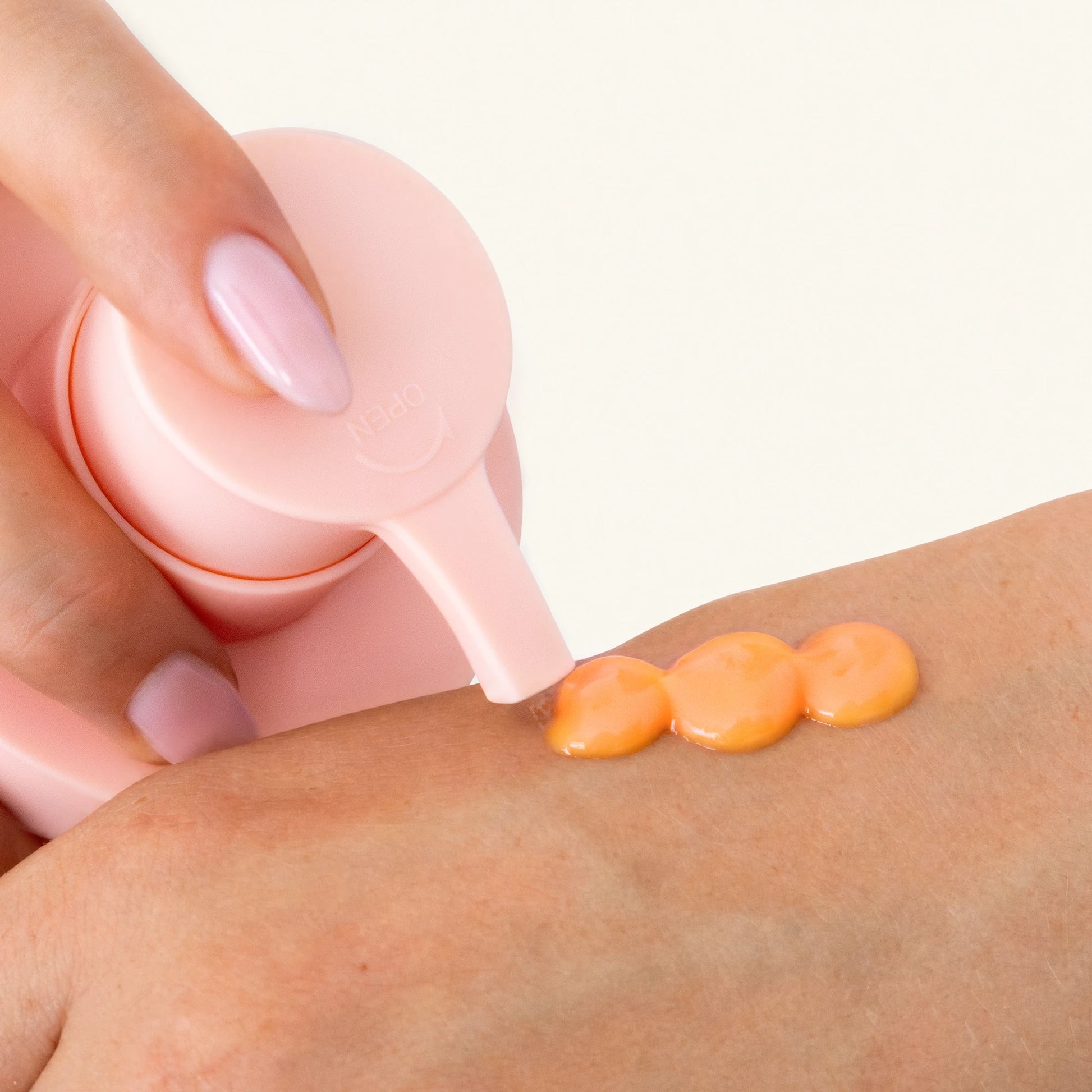 NOISS Brightening Jelly Day Cream dispensed on hand
