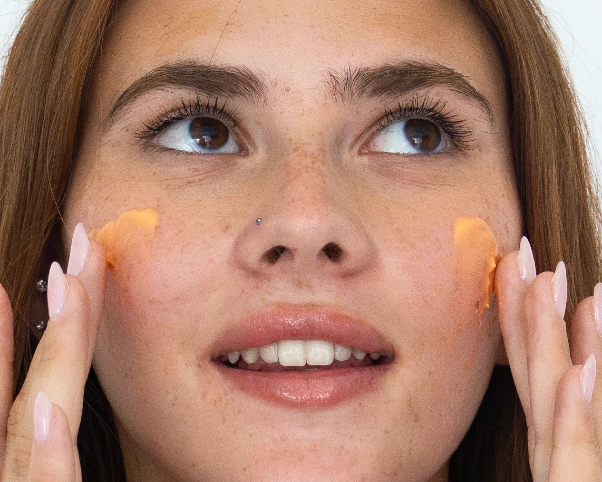 Creator holding NOISS Brightening Jelly Day Cream