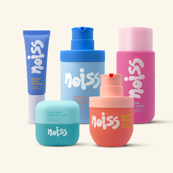 Collection of noiss skincare products in various colors on a white background