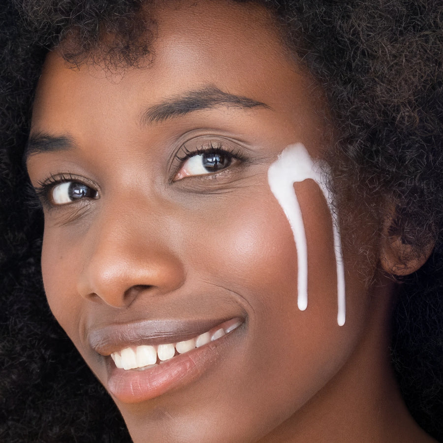 NOISS Glazing Milk Toner applied to face