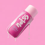 NOISS Glazing Milk Toner bottle tilted with milky texture dripping