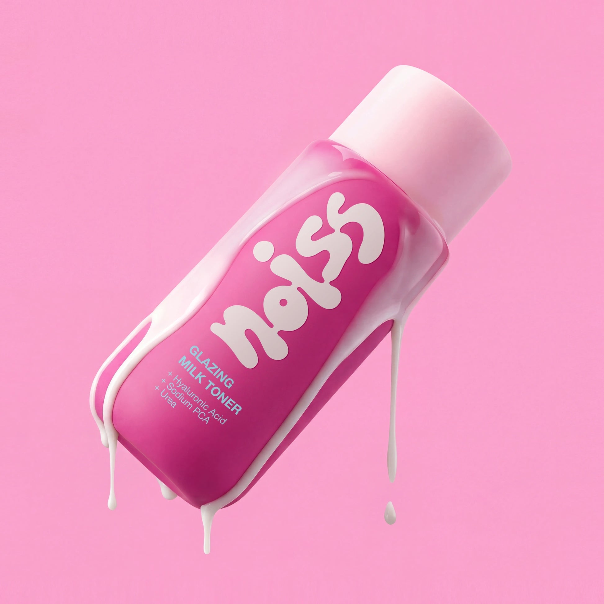 NOISS Glazing Milk Toner bottle tilted with milky texture dripping