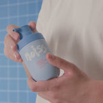 Creator holding NOISS Purifying Oxygen Foam Cleanser