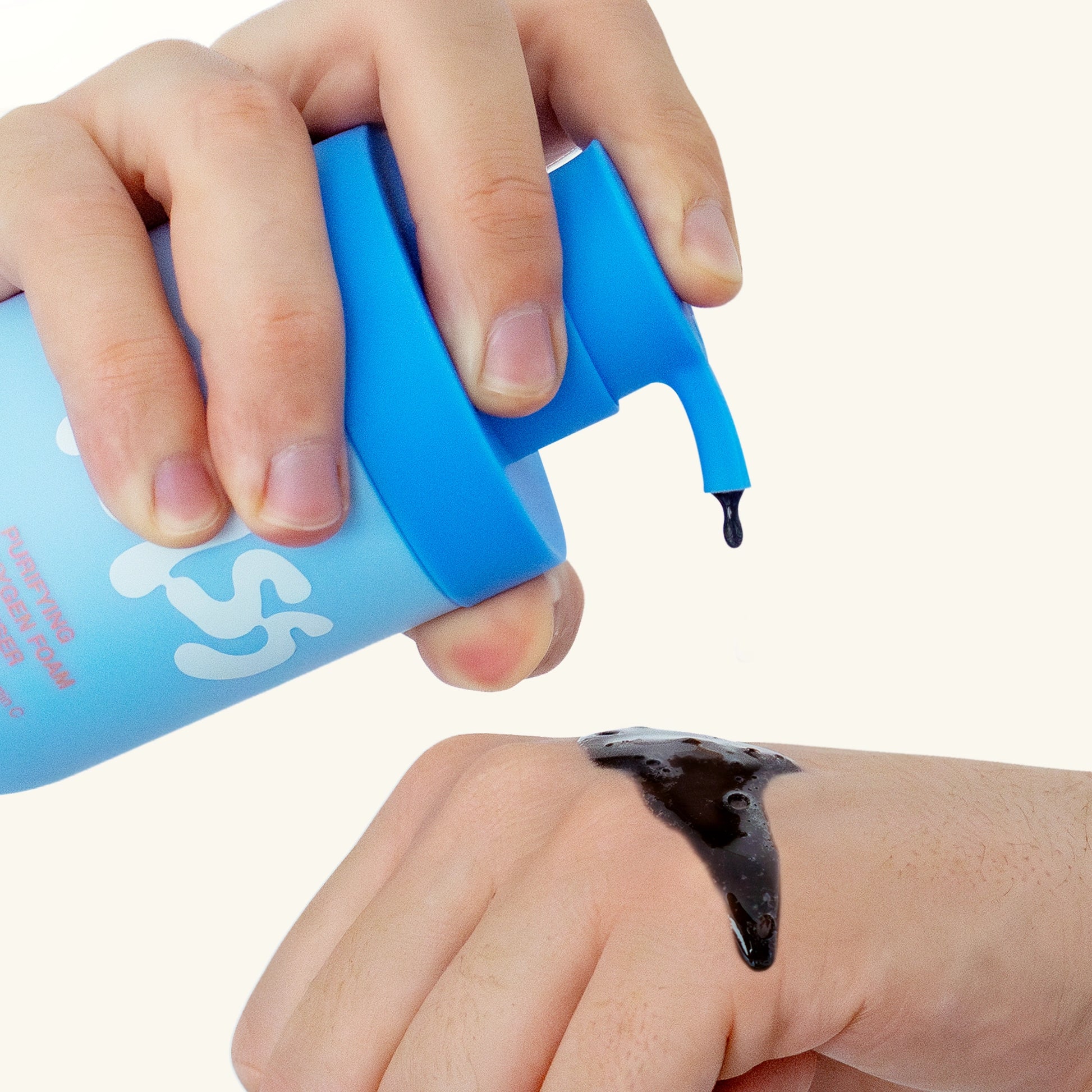 NOISS Purifying Oxygen Foam Cleanser foam dispensed on hand